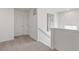 Upstairs hallway with carpet, neutral walls, and linen closet at 3319 Belleville Ridge Rd, Elizabeth, CO 80107