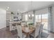 Kitchen with gray cabinets and an island at 3319 Belleville Ridge Rd, Elizabeth, CO 80107