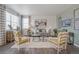 Living room with gray sofa and two armchairs at 3319 Belleville Ridge Rd, Elizabeth, CO 80107