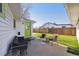 Relaxing patio with outdoor seating and green lawn at 5535 Brentwood St, Arvada, CO 80002