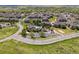 Aerial view of a community with a pool surrounded by lush landscaping at 12914 Ironstone Way # 102, Parker, CO 80134