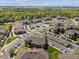 Scenic aerial view of a community featuring ample parking, landscaping and a pool at 12914 Ironstone Way # 102, Parker, CO 80134