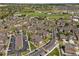Beautiful aerial view of the complex featuring lush landscaping and ample parking at 12914 Ironstone Way # 102, Parker, CO 80134