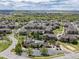 Sprawling aerial view of a well-planned community with lush greenery and scenic views at 12914 Ironstone Way # 102, Parker, CO 80134