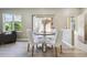 Bright dining area with comfortable seating and inviting ambiance at 12914 Ironstone Way # 102, Parker, CO 80134
