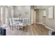 Dining room adjacent to the kitchen with bright light and modern finishes at 12914 Ironstone Way # 102, Parker, CO 80134