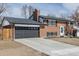 Attractive brick home with a well-maintained yard and an attached garage at 785 Planet Pl, Thornton, CO 80260