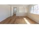 Spacious living room with hardwood floors and lots of natural light at 785 Planet Pl, Thornton, CO 80260