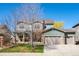 Two-story home with a two-car garage, lovely lawn, and attractive curb appeal at 16823 Weber Way, Mead, CO 80542