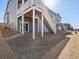 Exterior view of the home with a private back deck, offering outdoor living space at 9099 Pitkin St, Commerce City, CO 80022
