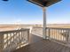 Outdoor deck overlooking vast landscapes, perfect for relaxation and enjoying the view at 9099 Pitkin St, Commerce City, CO 80022