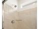 Modern shower with tile surround, glass door, and chrome fixtures at 9099 Pitkin St, Commerce City, CO 80022