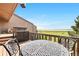 Enjoy stunning water views from this elevated back deck with metal outdoor furniture at 7300 W Stetson Pl # 46, Littleton, CO 80123