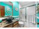 Bright bathroom with a unique sink, stylish shower, and plenty of space at 7300 W Stetson Pl # 46, Littleton, CO 80123