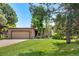 Inviting home with a well-maintained lawn and a two-car garage at 7300 W Stetson Pl # 46, Littleton, CO 80123
