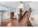 Foyer boasts hardwood floors, a split staircase, and a vaulted ceiling at 7300 W Stetson Pl # 46, Littleton, CO 80123
