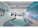 Unique indoor pool featuring custom design and underwater-themed murals, perfect for recreation and relaxation at 7300 W Stetson Pl # 46, Littleton, CO 80123