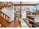 Bright living room with high ceilings, hardwood floors, and a unique staircase at 7300 W Stetson Pl # 46, Littleton, CO 80123