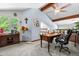 Comfortable home office has carpet, exposed ceiling beams, and large windows at 7300 W Stetson Pl # 46, Littleton, CO 80123