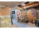Basement with musical instruments, open door, and exposed piping at 328 S Lincoln St, Denver, CO 80209