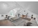 Airy bedroom with vaulted ceiling, hardwood floors, neutral rug, and modern decor at 328 S Lincoln St, Denver, CO 80209