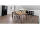 Spacious bonus room featuring wooden floors and large windows at 328 S Lincoln St, Denver, CO 80209