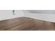 Close up of a bonus room showing wood floors and a sloped ceiling at 328 S Lincoln St, Denver, CO 80209