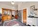 Well-appointed kitchen featuring tile floors, a stainless steel refrigerator, and wood cabinets at 328 S Lincoln St, Denver, CO 80209