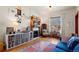 Inviting living room with a fireplace, hardwood floors, and stylish furnishings at 328 S Lincoln St, Denver, CO 80209