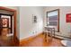 Bright office space with natural light, hardwood floors, and a view down the hallway at 328 S Lincoln St, Denver, CO 80209