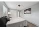 Relaxing bedroom with a calming aesthetic, featuring a large painting and closet at 3930 S Hazel Ct, Englewood, CO 80110