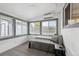 Comfortable bedroom with multiple windows and stylish gray trim at 3930 S Hazel Ct, Englewood, CO 80110