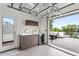 Indoor/outdoor space featuring wet bar and deck, creating seamless entertaining at 3612 Wyandot St, Denver, CO 80211