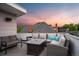 Inviting rooftop deck with comfortable seating and a stylish fire pit, perfect for outdoor relaxation at 3612 Wyandot St, Denver, CO 80211