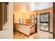 Entryway features tile floors, staircase, a glass window and a view to the front door at 17306 W 17Th Pl, Golden, CO 80401