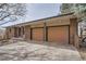 The exterior shows a brick home with a two-car garage, and a concrete driveway at 17306 W 17Th Pl, Golden, CO 80401