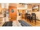 A modern kitchen with hardwood floors and light-colored wooden cabinets at 17306 W 17Th Pl, Golden, CO 80401