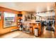 Living room features a small bar area, mountain views and a view into the living room at 17306 W 17Th Pl, Golden, CO 80401