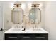 Bathroom with dual sinks, a quartz countertop, and designer fixtures at 3142 W 26Th Ave, Denver, CO 80211