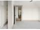 Neutral bedroom boasts carpet, gray trim and adjoins closet and bathroom at 3142 W 26Th Ave, Denver, CO 80211