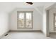 Neutral bedroom featuring carpeted floors, neutral paint, and double-hung windows at 3142 W 26Th Ave, Denver, CO 80211