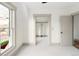 This bedroom offers carpet, gray trim and doorway to a walk-in closet at 3142 W 26Th Ave, Denver, CO 80211