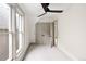 Bedroom featuring carpeted floors, neutral paint, and a closet with bi-fold doors at 3142 W 26Th Ave, Denver, CO 80211