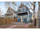 Charming two-story home boasts a balcony, inviting deck and fenced yard at 3142 W 26Th Ave, Denver, CO 80211