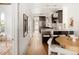 Kitchen with stainless steel appliances and dark cabinets at 3142 W 26Th Ave, Denver, CO 80211