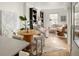 Spacious living area with modern furniture, artwork, and natural light at 3142 W 26Th Ave, Denver, CO 80211