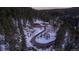 A private mountain home nestled among the trees with a long driveway at 32094 Christopher Ln, Conifer, CO 80433