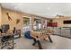 Game room featuring a foosball table, desk, and comfortable seating perfect for entertainment at 32094 Christopher Ln, Conifer, CO 80433