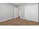 Neutral bedroom with closet doors and room for personalization at 3971 S Quintero Way, Aurora, CO 80013