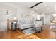 Inviting living room featuring hardwood floors and an open floor plan at 3971 S Quintero Way, Aurora, CO 80013